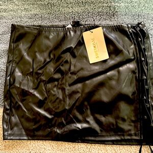 SHEIN faux leather skirt. Size Large . Slit on left side.